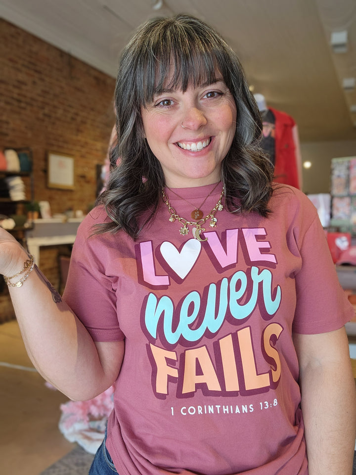 Love Never Fails Tee